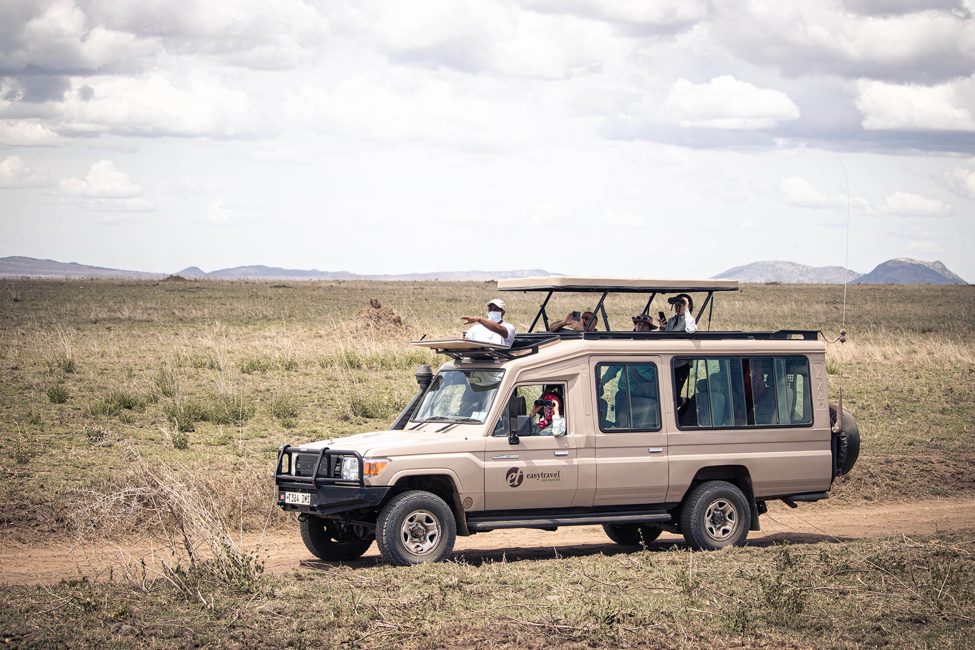 Guests on Safari in Easy Travel Safari Vehicle - Easy Travel Tanzania