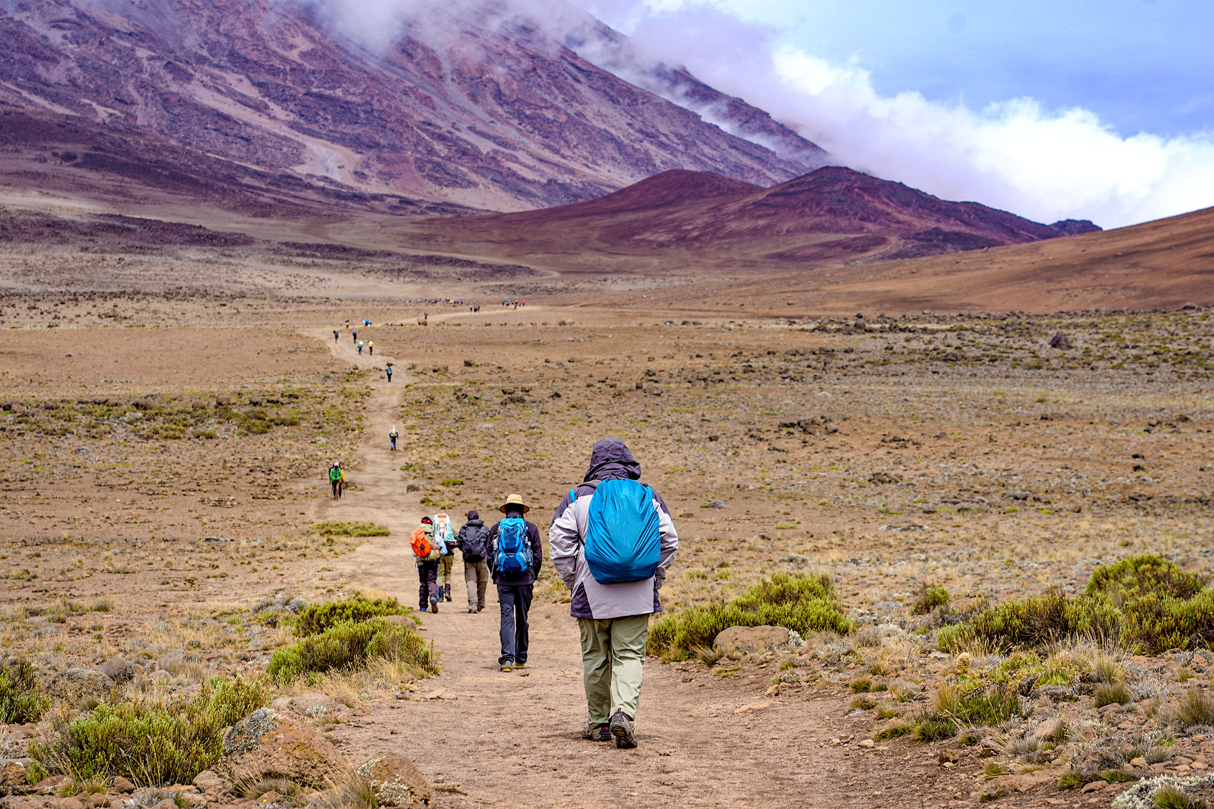 Hikers on the alpine desert trails of Mount Kilimanjaro, Tanzania