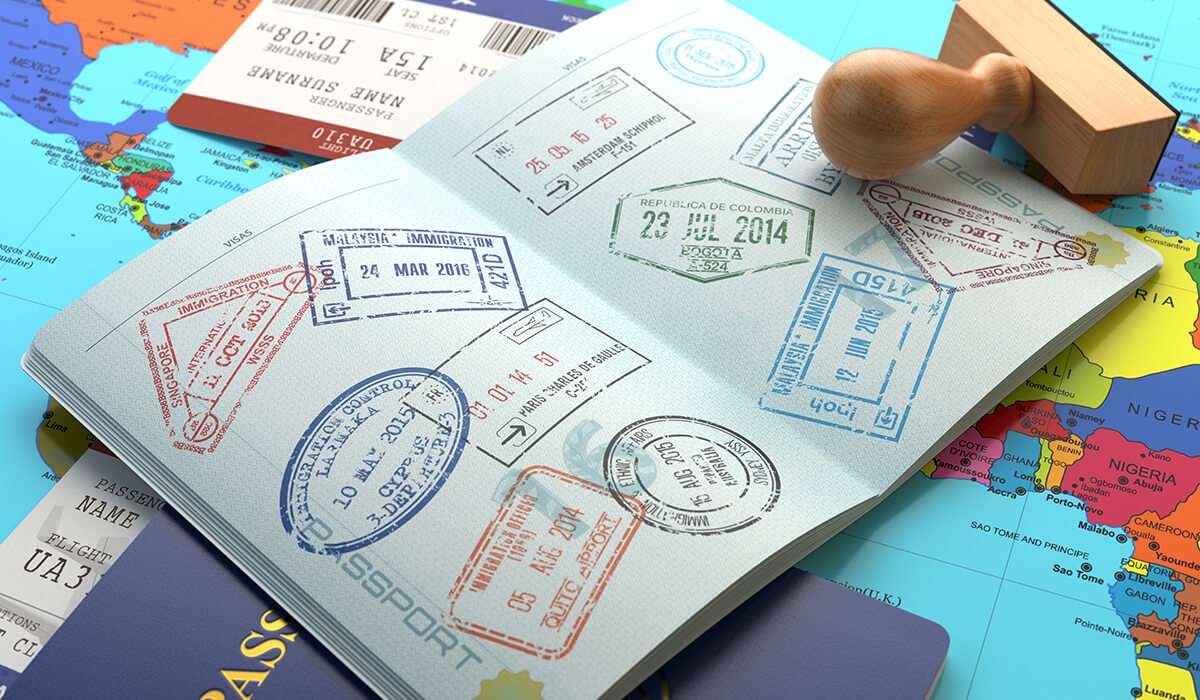Open passport with stamp