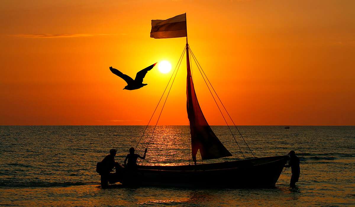 Boot in zonsondergang