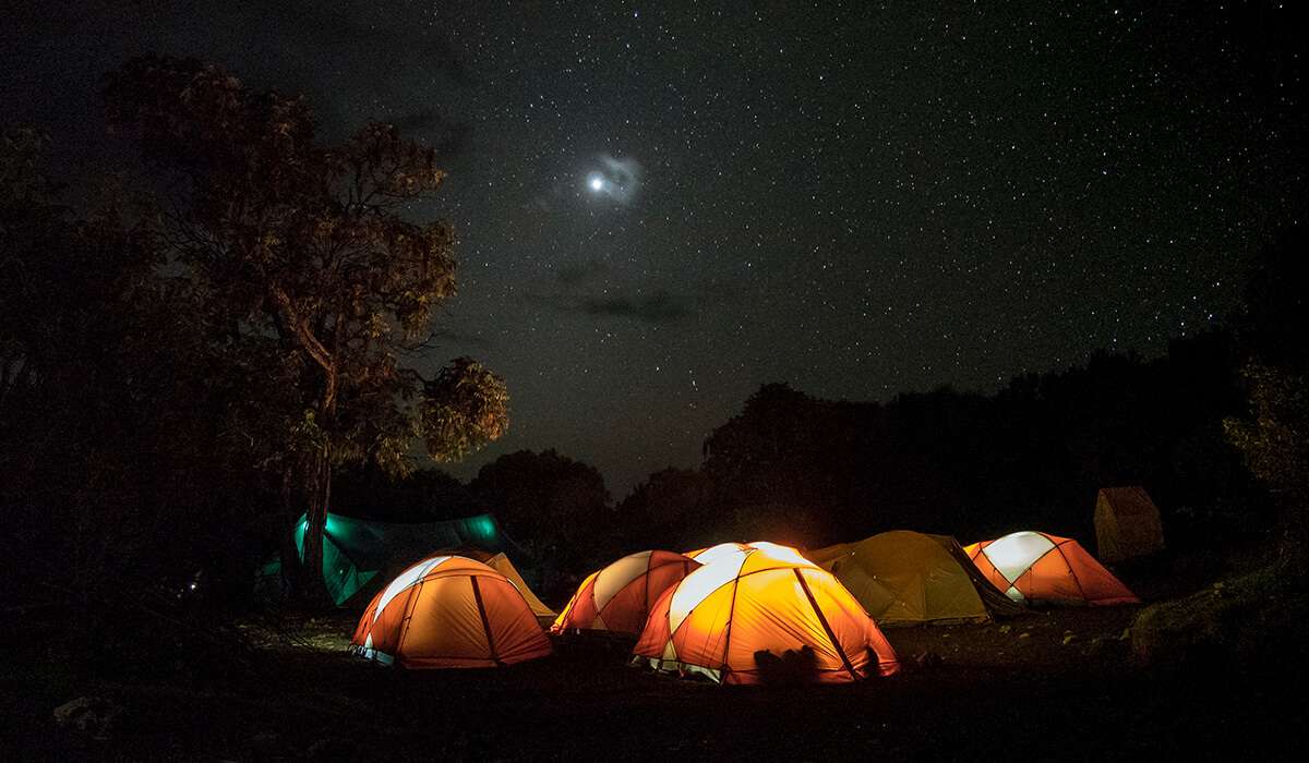 Tents under moonlight