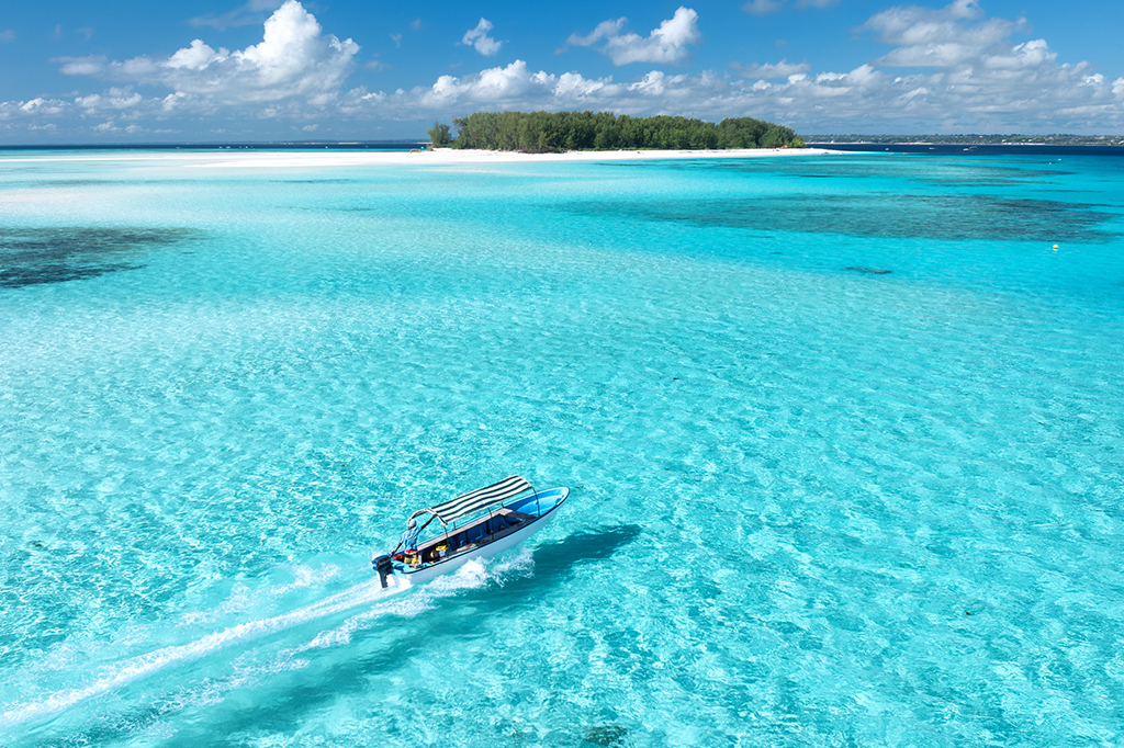 Aerial view of boat transfer to Mnemba Island, Tanzania