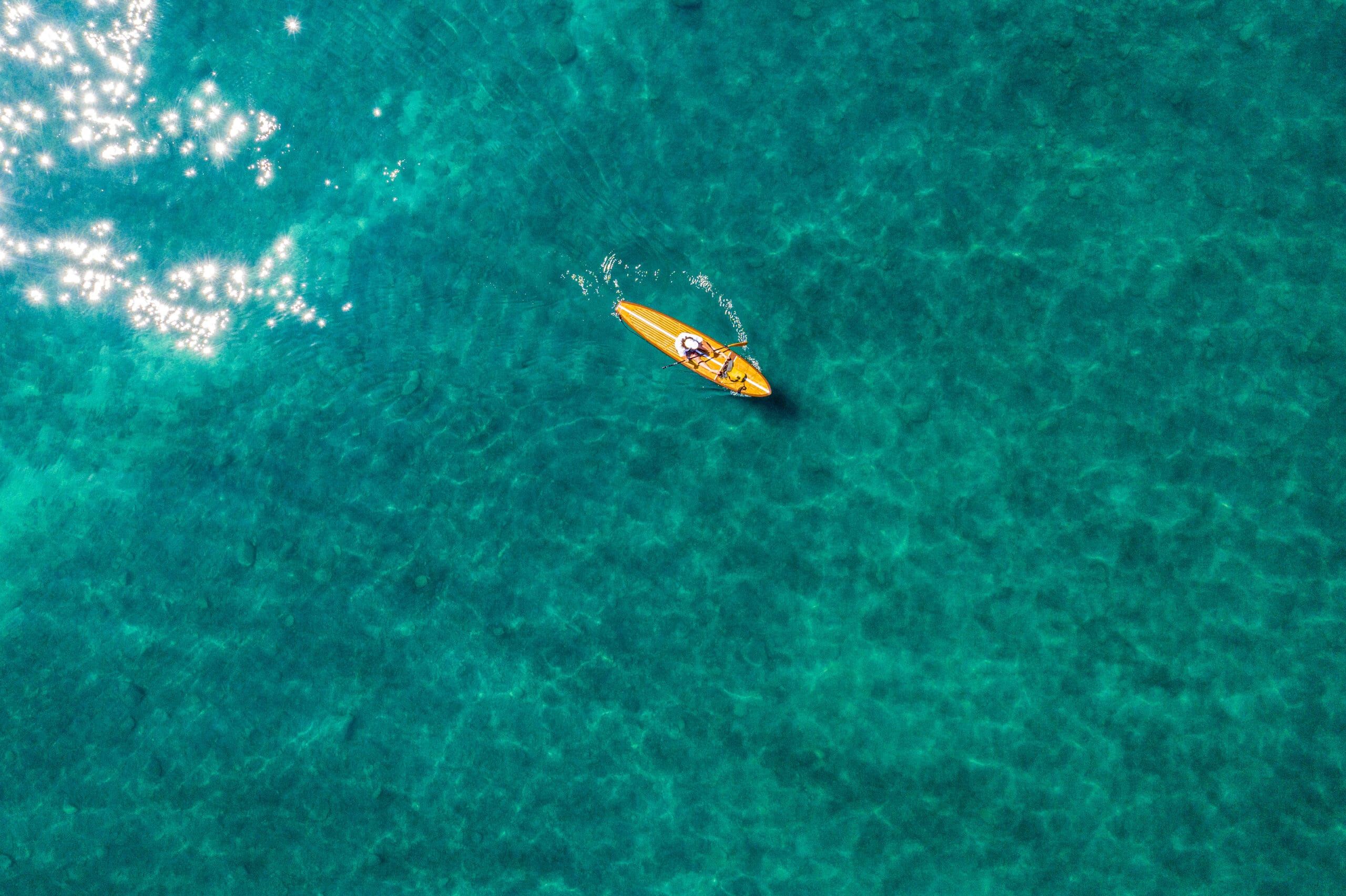 Enjoying the clear waters and scenic views at Mnemba Island