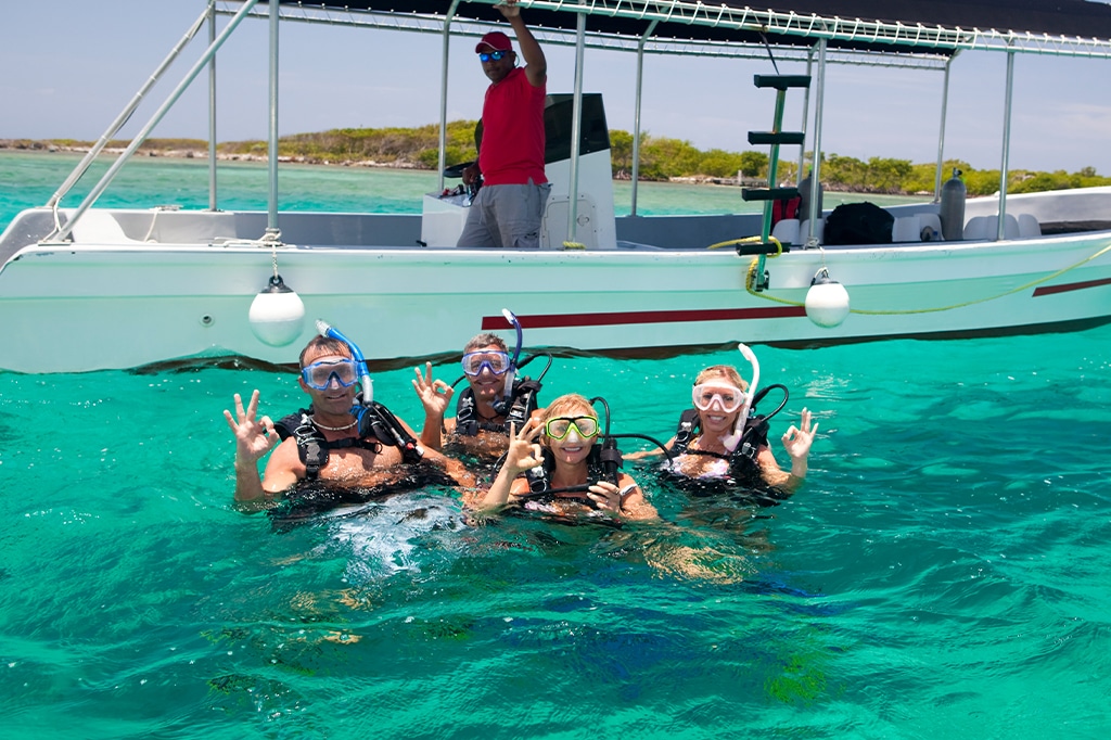 Tourists diving at Pingwe beach, Zanzibar, Tanzania