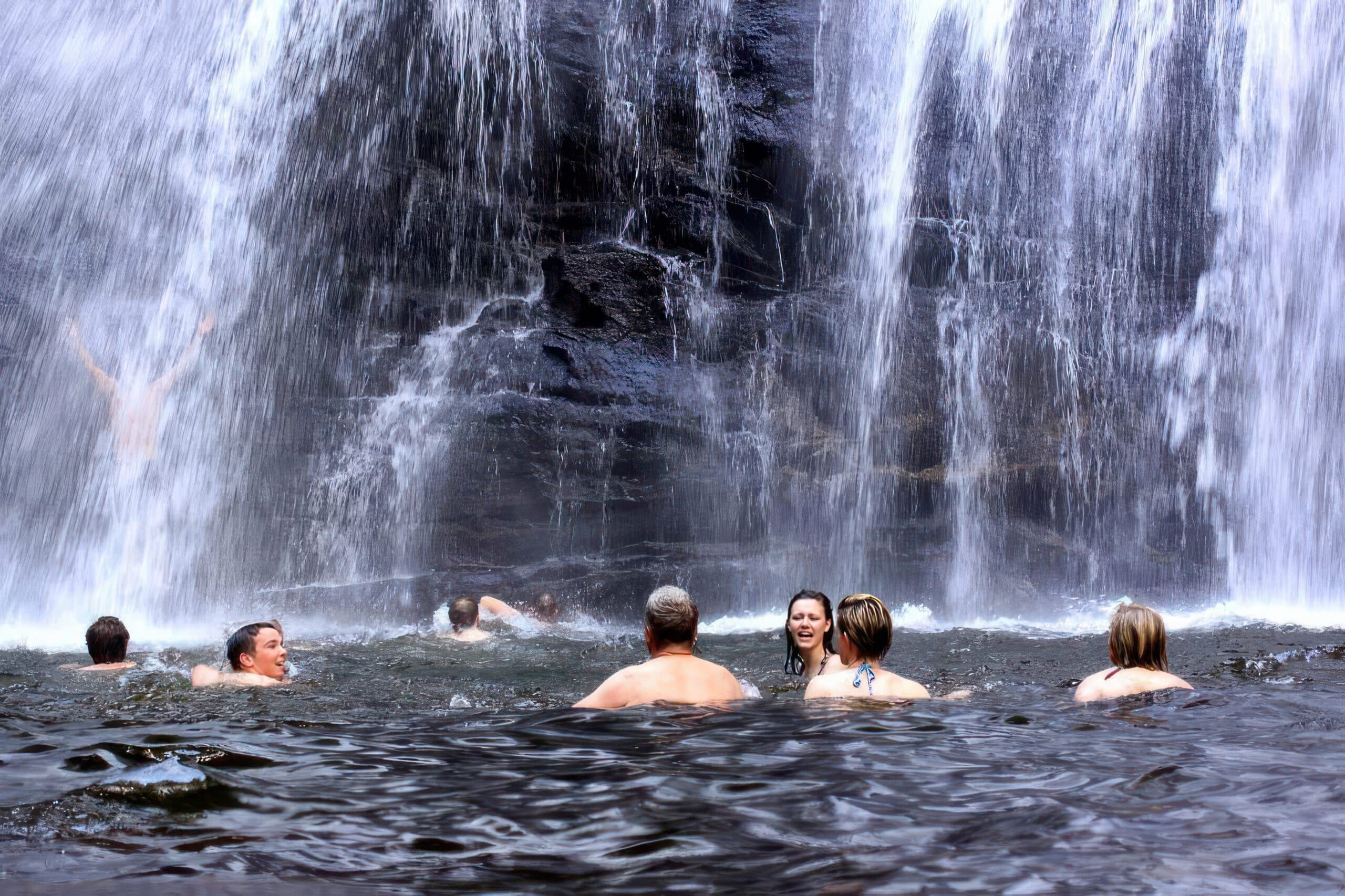 Visit Udzungwa: Visitors swimming in Sonje waterfalls at Udzungwa Mountains National Park