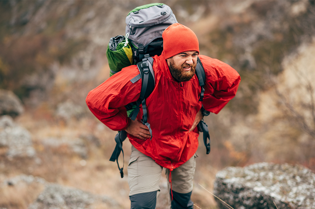A hiker with low stamina struggling to climb Mount Kilimanjaro A hiker with low stamina struggling to climb Mount Kilimanjaro