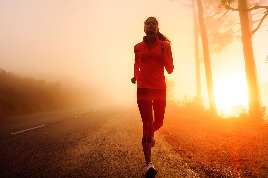 Young woman on an early morning jog